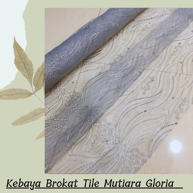 Kain Brokat Tile Mutiara Gloria  warna Silver Abu