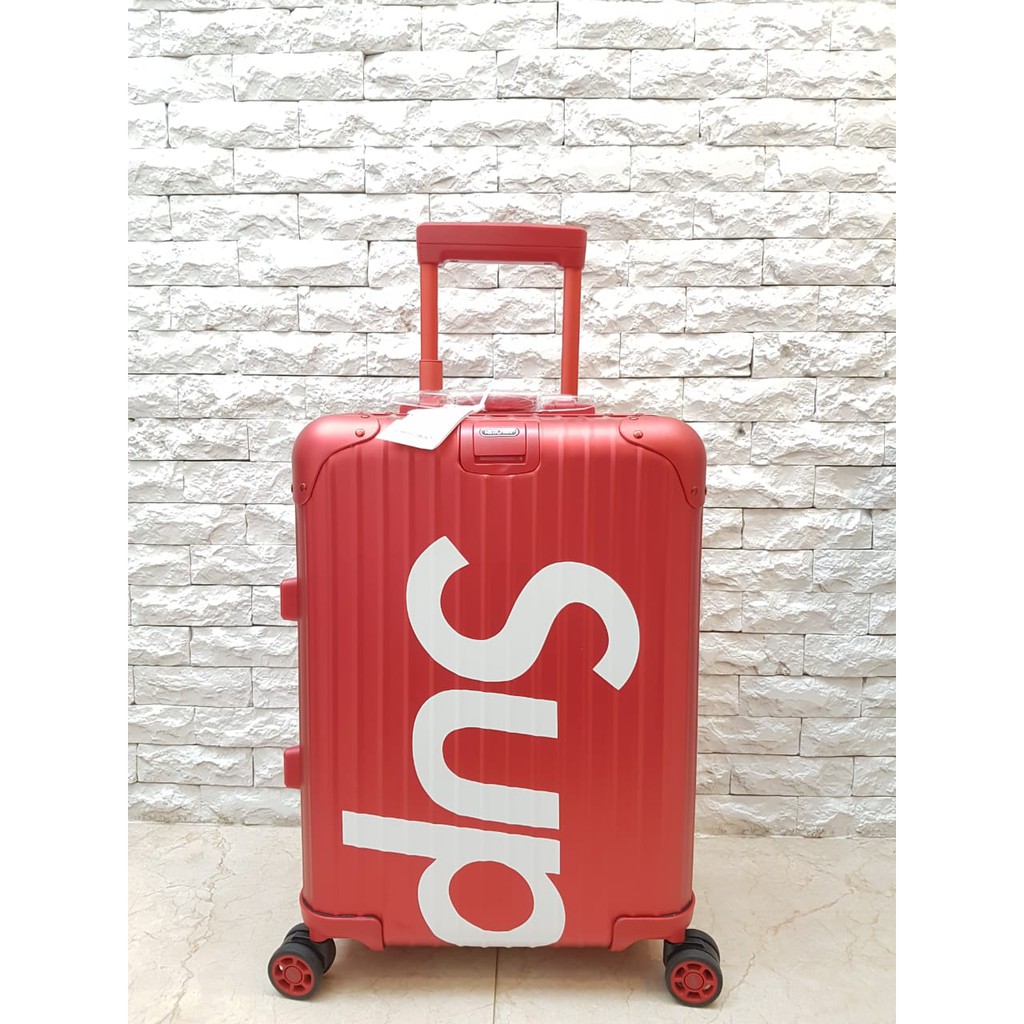 koper supreme rimowa