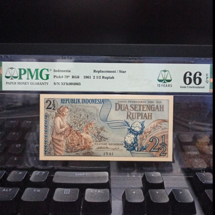 Uang kuno 2 1/2 (2.5) Rupiah Seri sandang pangan PMG 66 EPQ Replacement