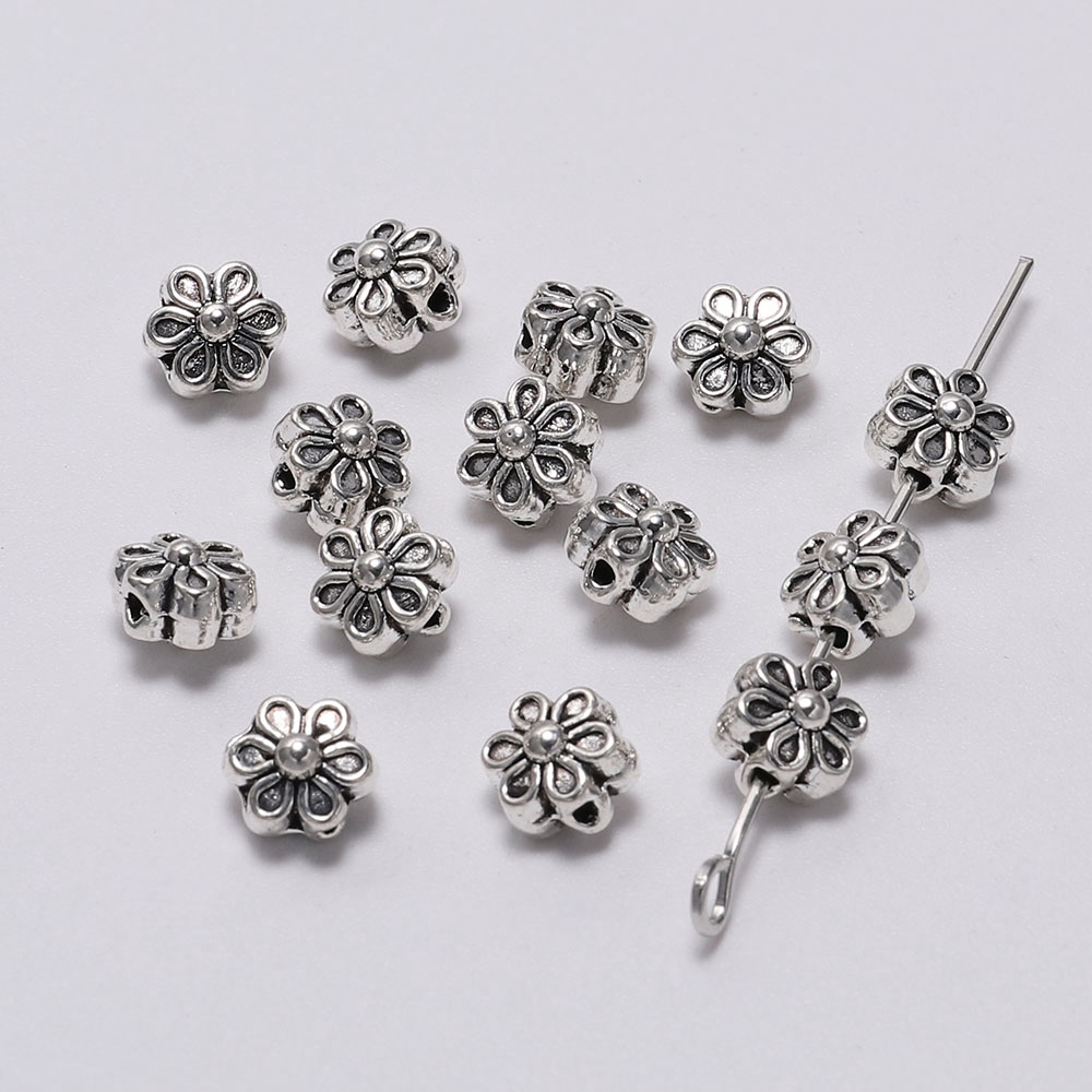 50pcs / Lot Manik-Manik Bunga Tibet Antik Bahan Metal Ukuran 6mm Untuk Membuat Perhiasan Diy