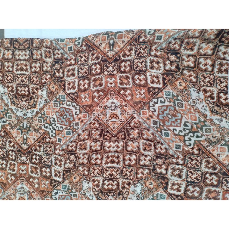 KAIN CERUTI COKLAT MOTIF BATIK ( 230 cm = 52.900 )