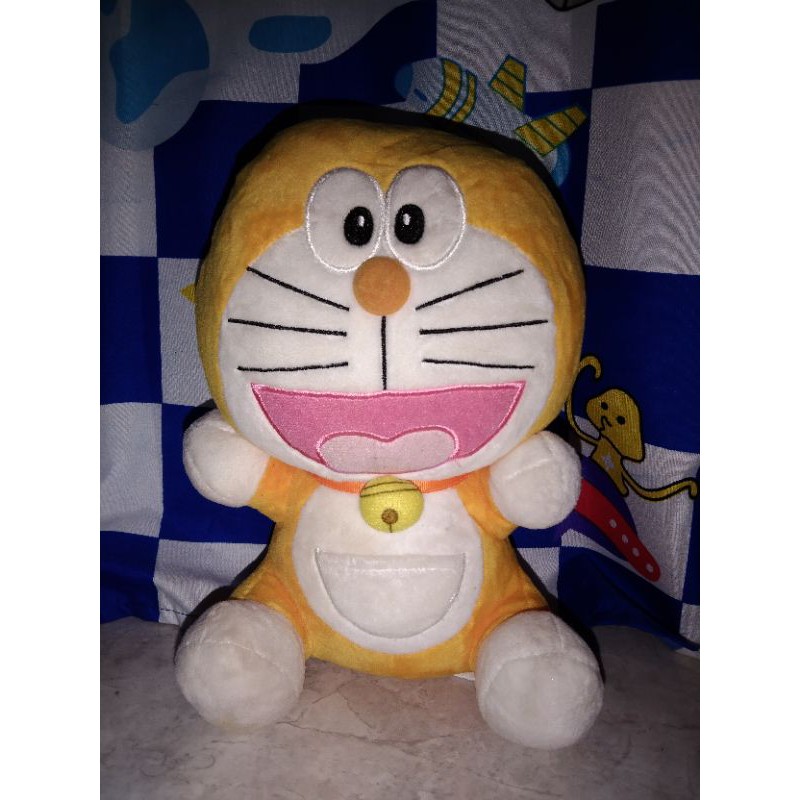 Boneka Doraemon kuning, asli brand doaremon