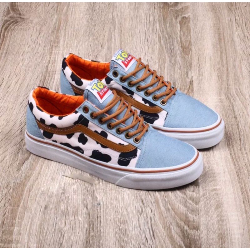 Sepatu Vans Oldskool X Motif Toy Story WOODY COW Disney Pixar Denim Blue Sky