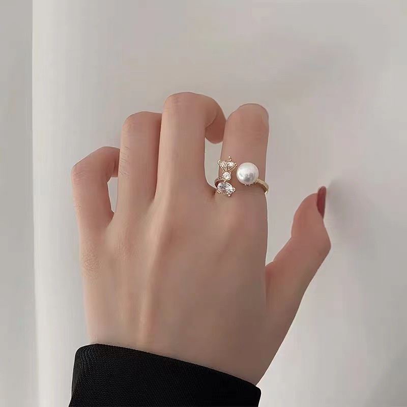 Cincin Emas Model Terbuka Desain Pita Aksen Mutiara Kristal Gaya Korea Untuk Wanita