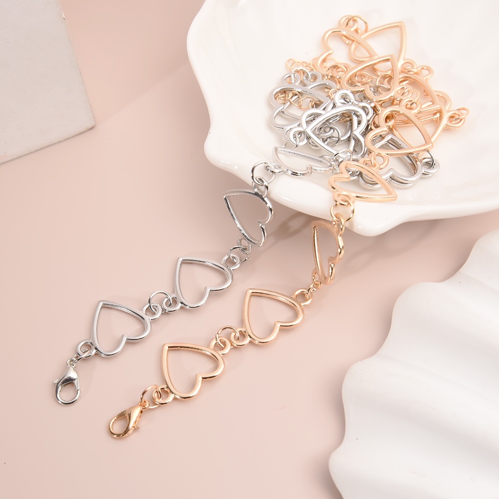 Kalung Choker Liontin Bentuk Hati Hollow Bahan Metal Gaya Punk Hip-Hop Vintage Untuk Wanita