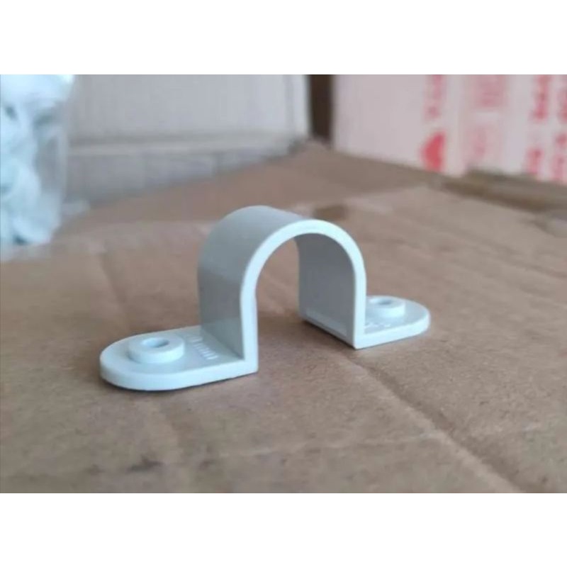 Klem pipa listrik / klem pipa pvc conduit 20mm omega + paku beton