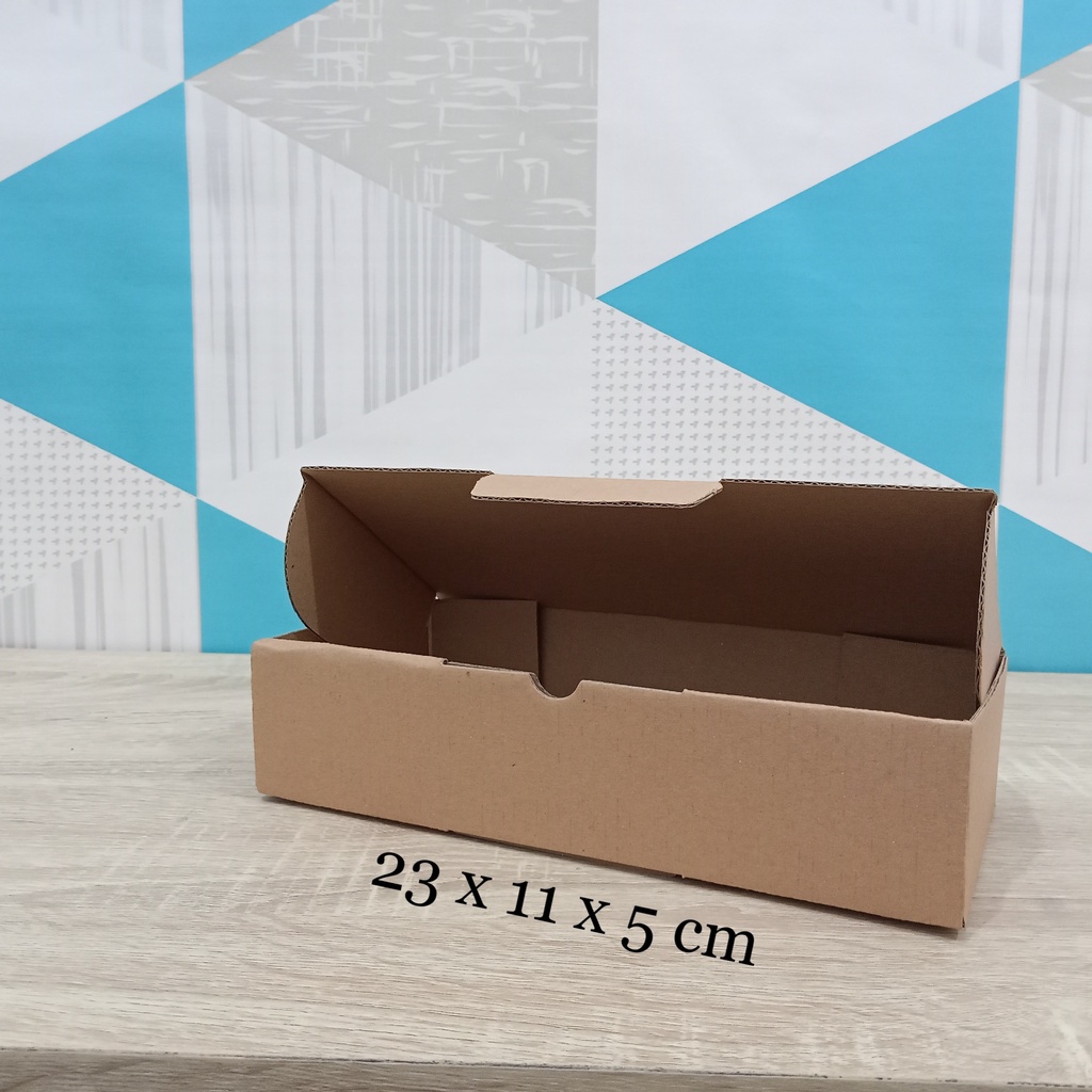 

Kardus 23 x 11 x 5 cm....Die Cut kotak aksesoris dll