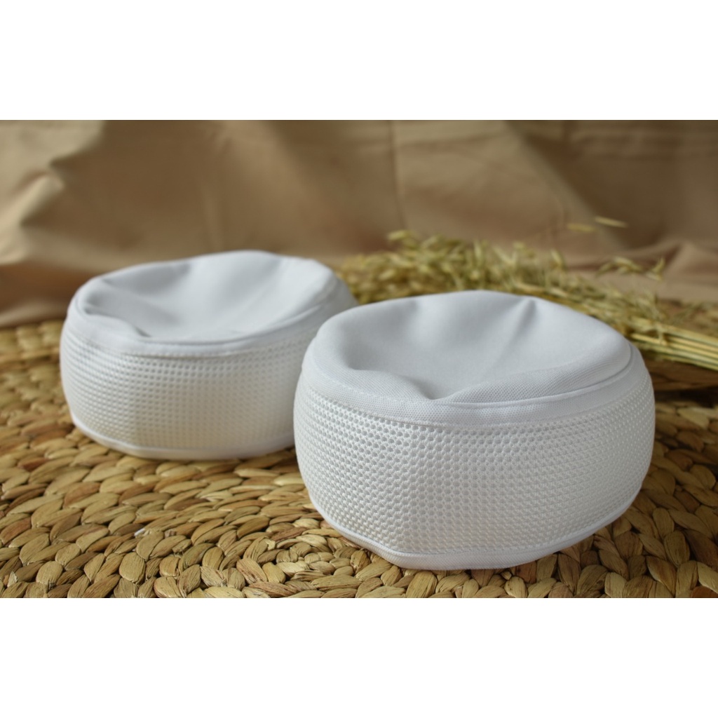 Peci putih taliban dewasa