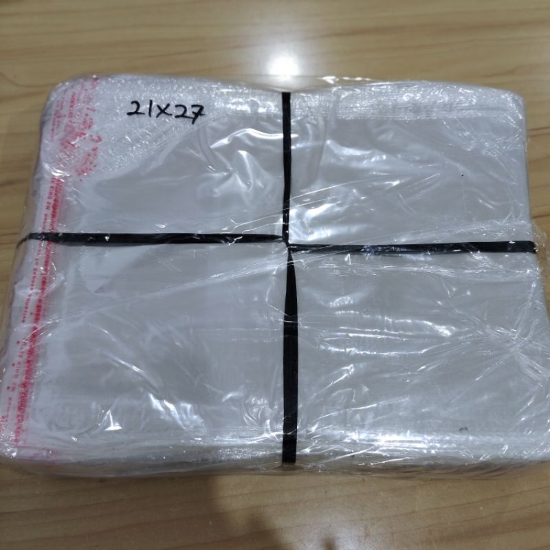 

Opp Plastik Lem Uk 21x27 /Plastik Undangan / Plastik Masker / Serbaguna