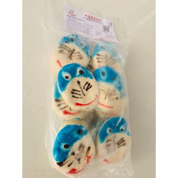 

roti boneka bentuk Doraemon