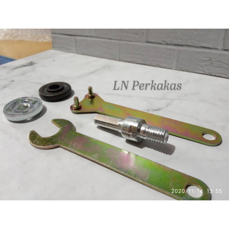 Adaptor gerinda untuk mesin bor listrik