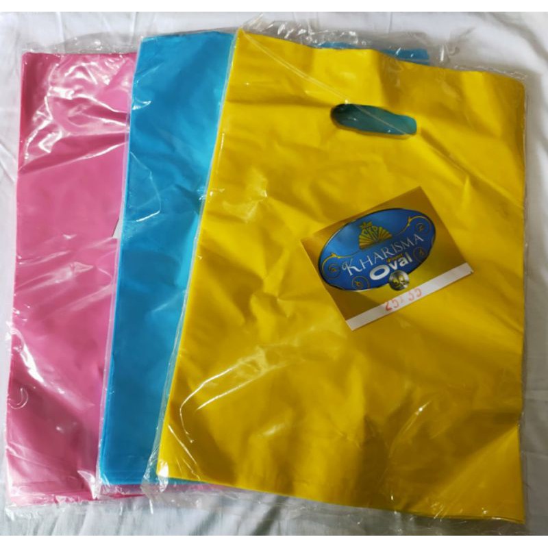 Plastik olshop merk kharisma polos 25x35/Plastik Olshop Motif Daisy 25x35