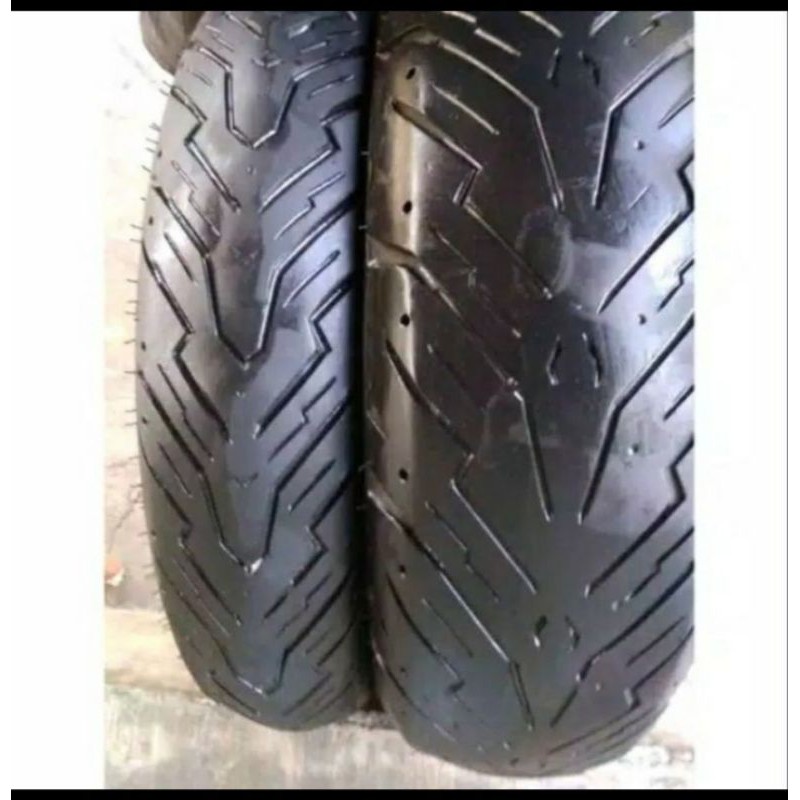 Sepasang ban pirelli uk120/70-140-70-13