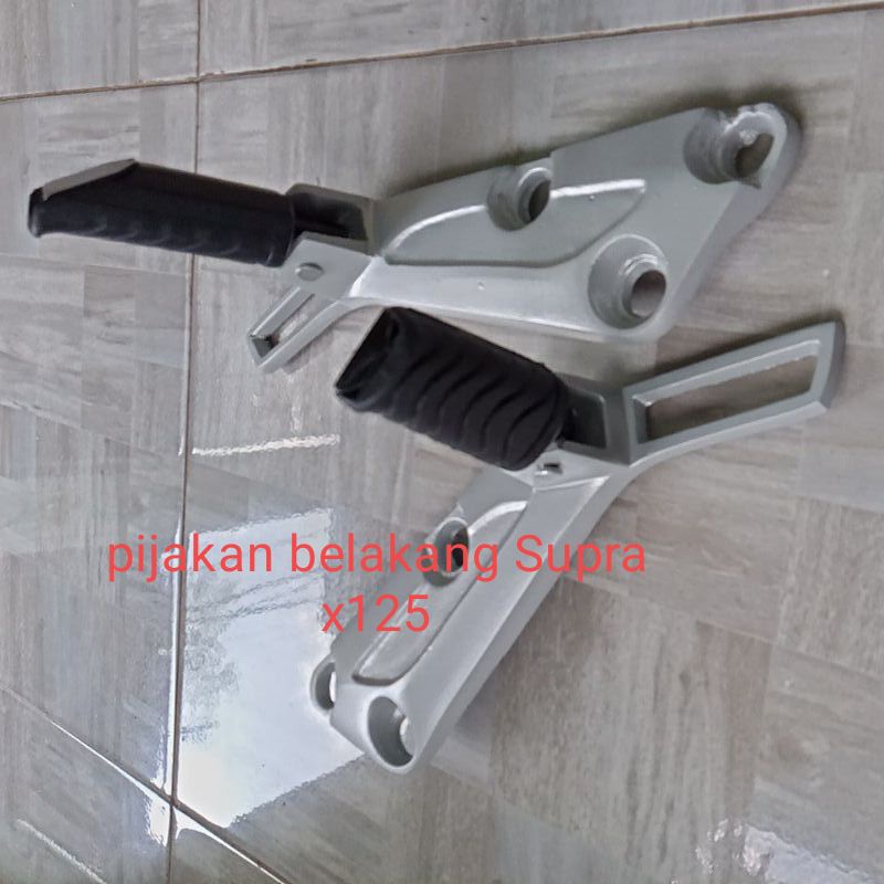 pijakan belakang Supra x 125
