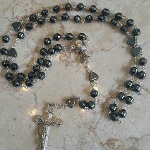 ROSARIO BATU BLUSTIN