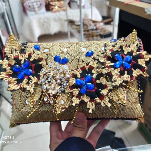 Clutch pesta kondangan tapis Lampung mata biru