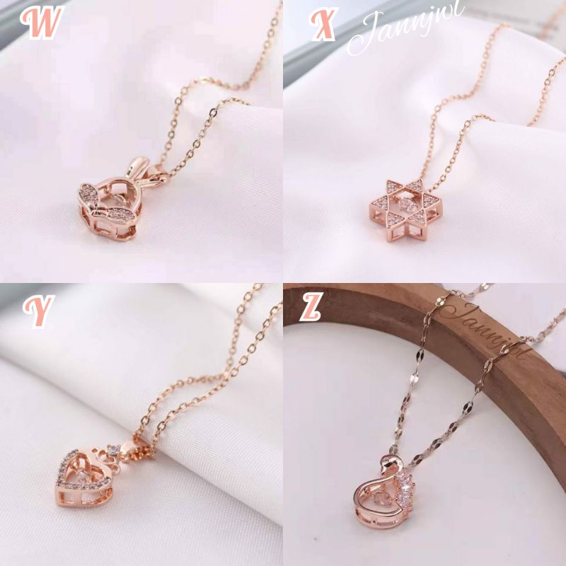kalung titanium liontin dancing stone anti karat