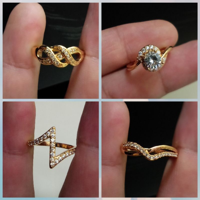 Cincin xuping wanita berlapis emas dengan mata zircon.