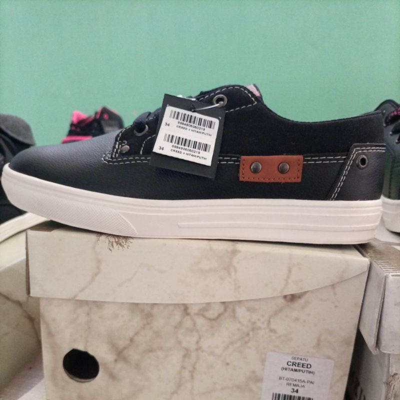 Sepatu Tomkins Creed