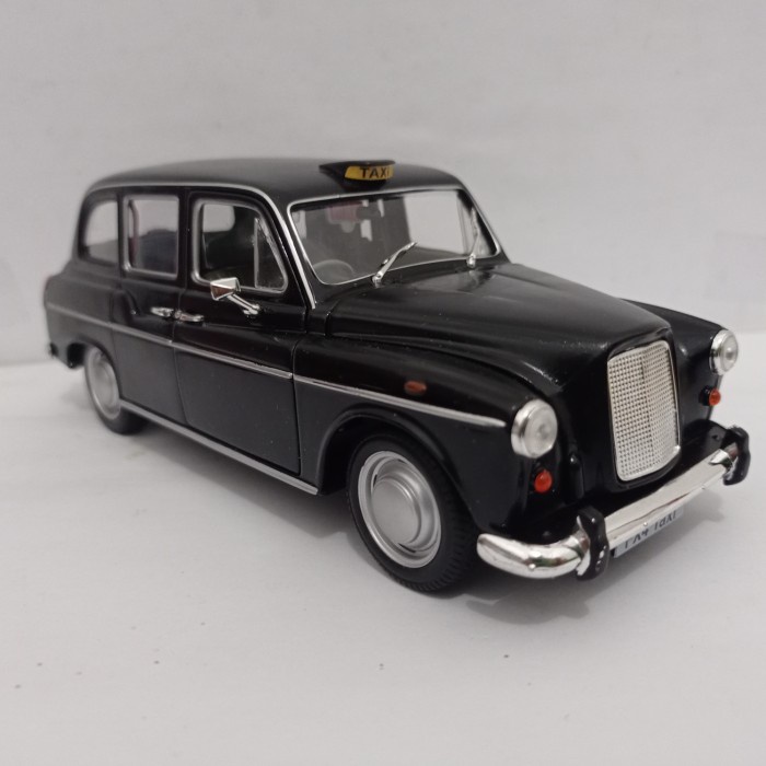 Diecast mobil London taxi Austin FX4 Welly 1:24 mainan koleksi murah