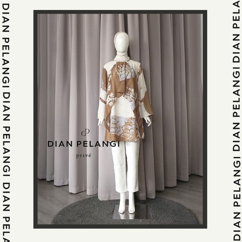 DIAN PELANGI AQILA TUNIK MUSLIM CERUTI ABSTRAK