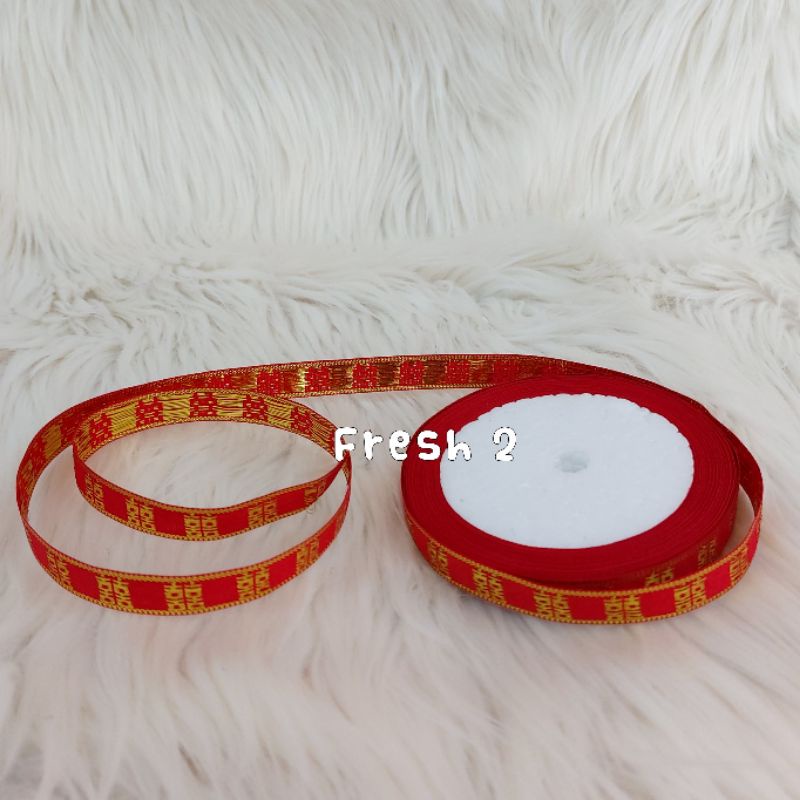 

pita shuangxi lebar 1 cm / pita sangjit / pita merah /