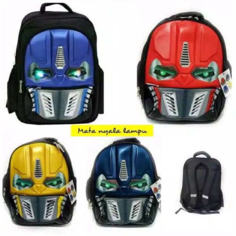 TAS RANSEL ANAK LAKI LAKI ROBOT TRANSFOMER MATA LAMPU LED IMPORT TERBARU