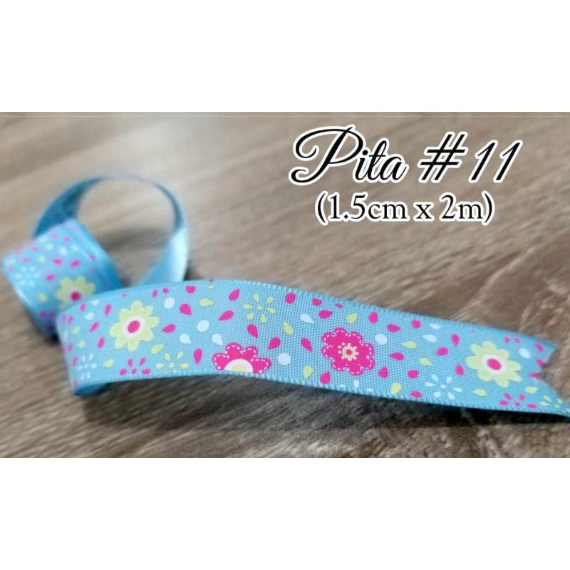 

PITA MOTIF BUNGA