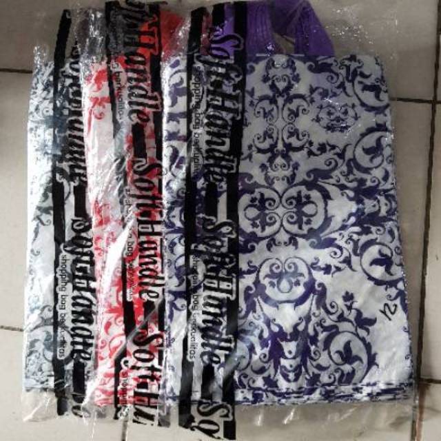 

plastik softhadle tangkai warna warni uk.25x35 (isi 50 lbr)