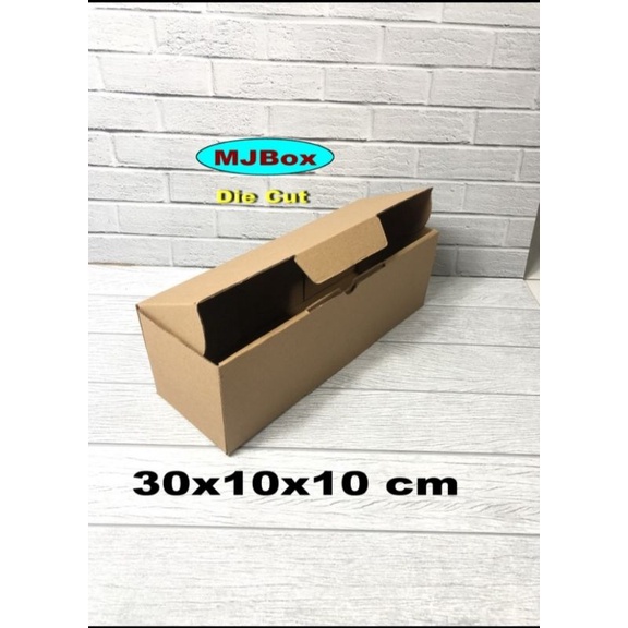 

Kardus uk. 30x10x10 cm model Diecut karton box
