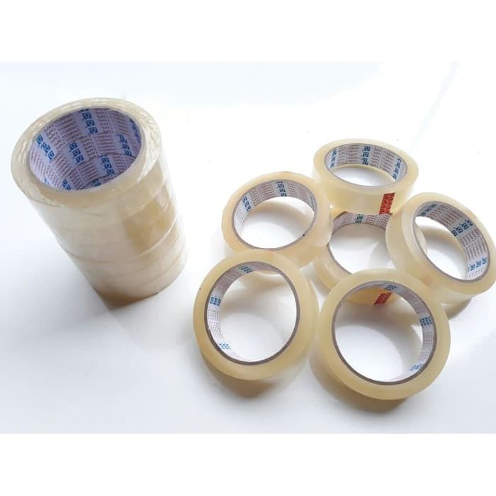 

LAKBAN BENING REKAT KUAT KUALITAS TERBAIK HARGA 1 ROLL SATUAN 72 YARD