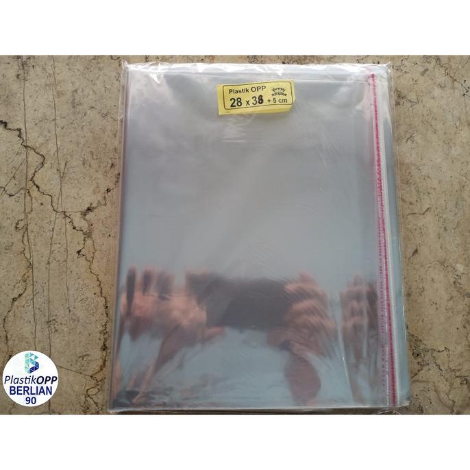 

] PLASTIK OPP 28X35 CM TEBAL 20 MIC / PLASTIK BAJU ISI 100 LBR