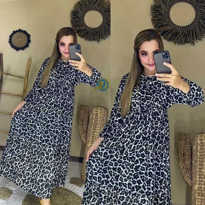 Gamis motif macan tutul