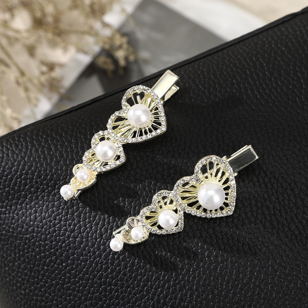 2pcs / Set Jepit Rambut Mutiara Berlian Imitasi Gaya Korea Untuk Wanita