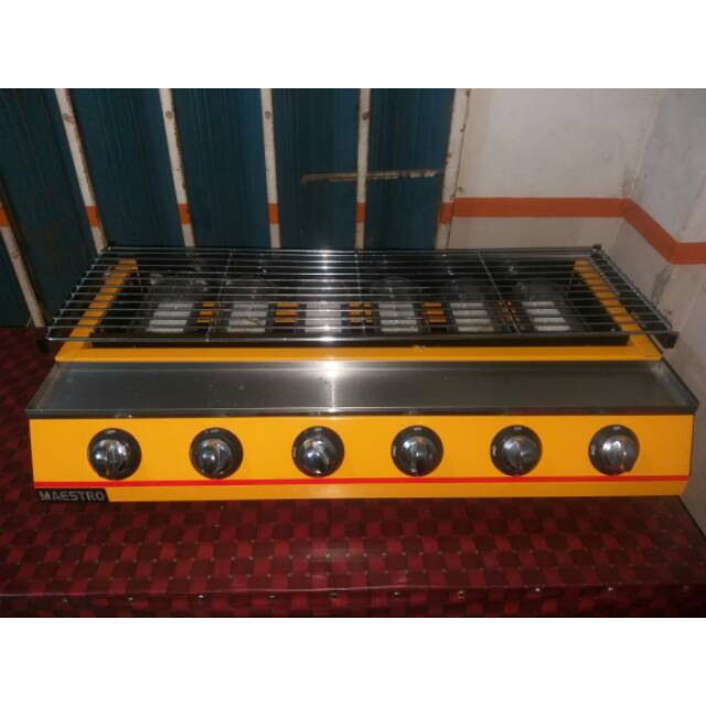 Roster atau panggangan sosis dan bbq bekas 6 tungku merek Maestro