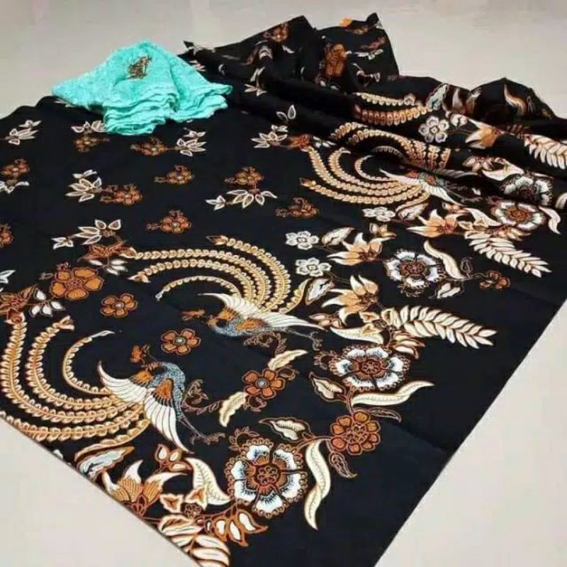 Kain batik kota solo dengan motif merak kembar