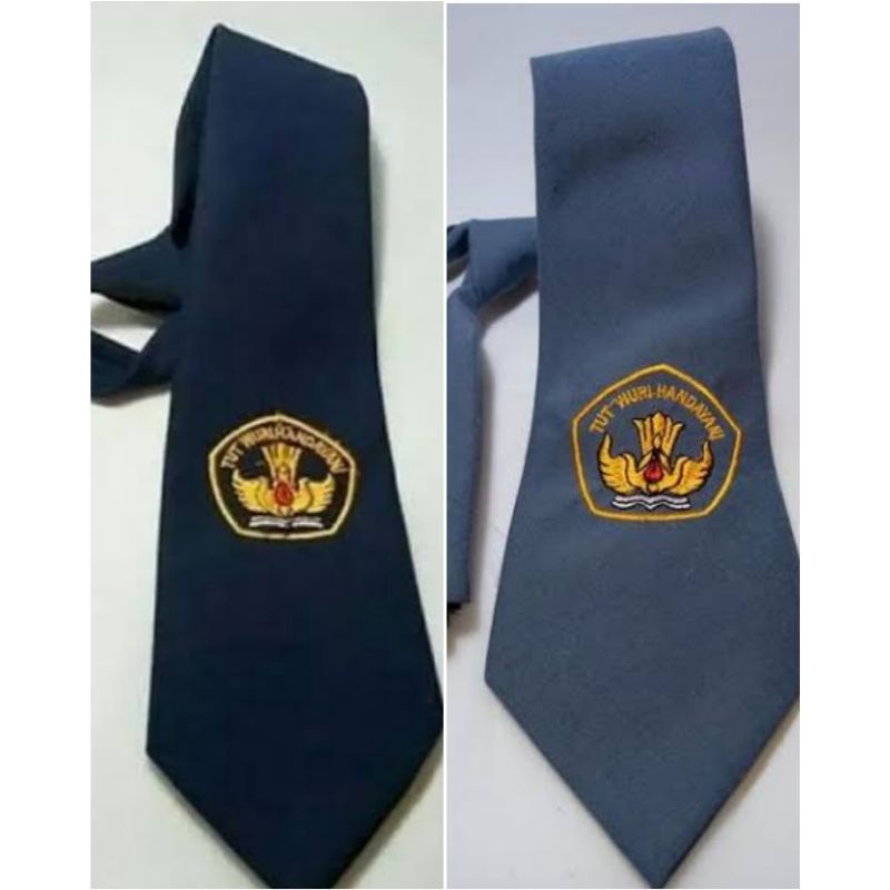 

Dasi SMP SMA Bordir dan Polos bahan Katun Famatex
