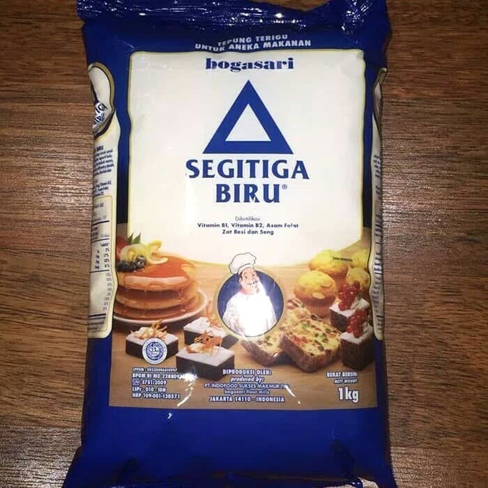 

b011tee Segitiga Biru Tepung Terigu 1Kg Da01D100