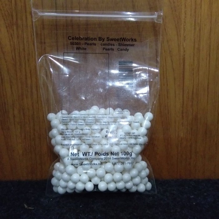 

Sprinkle sugar pearls white 100gr