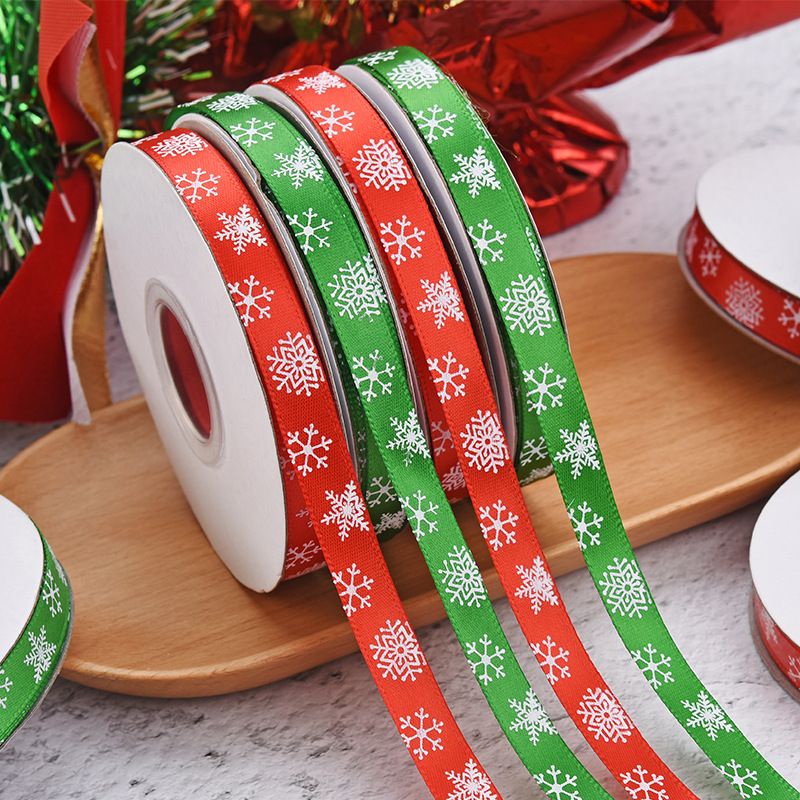 

NEW (Harga PER ROLL )Pita satin / Pita Natal Snowflake / Pita Merry Christmas / Pita Natal Motif Salju