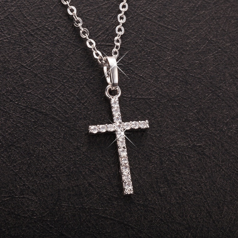 Kalung Liontin Salib Yesus Bahan Stainless Steel Aksen Kristal Untuk Wanita