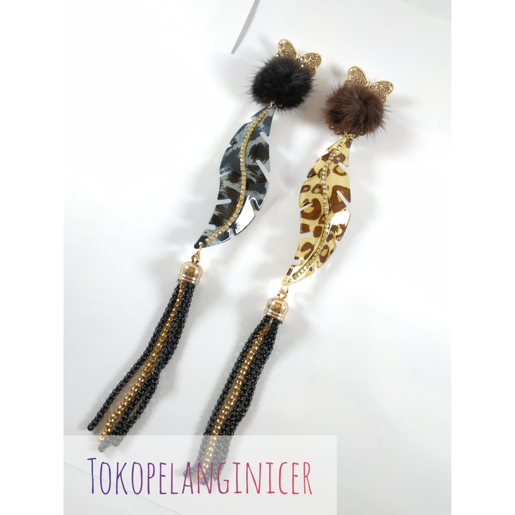 Bros Dagu Hijab pompom juntai macan by tokopelanginicer