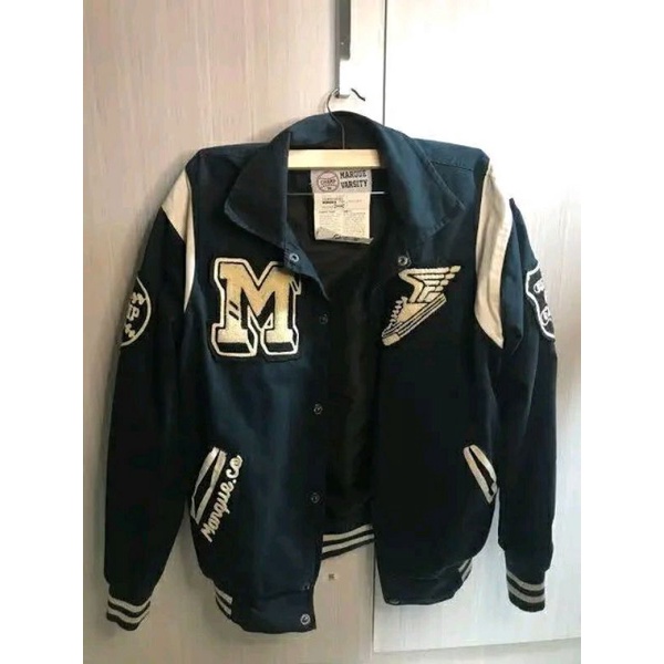 VARSITY MARQUE