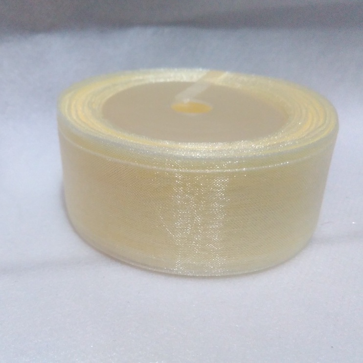 

Pita Organdi Biasa Cream Ukuran 1 inch/2,5 Per Roll