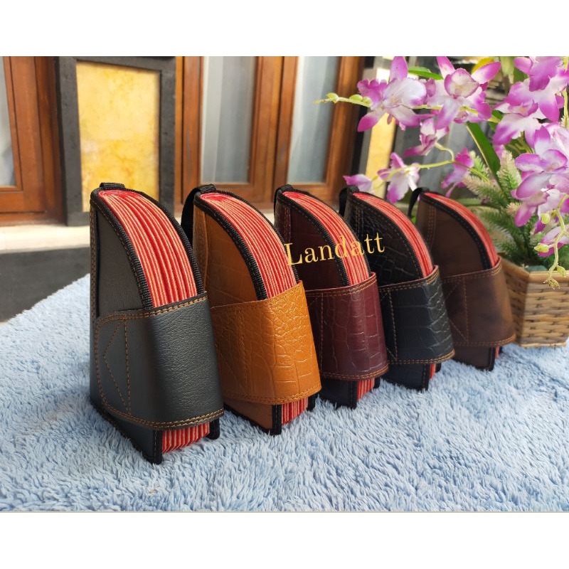 Dompet Taji Segitiga