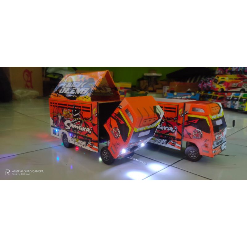 Miniatur truk oleng Samurai X lampu Trepal