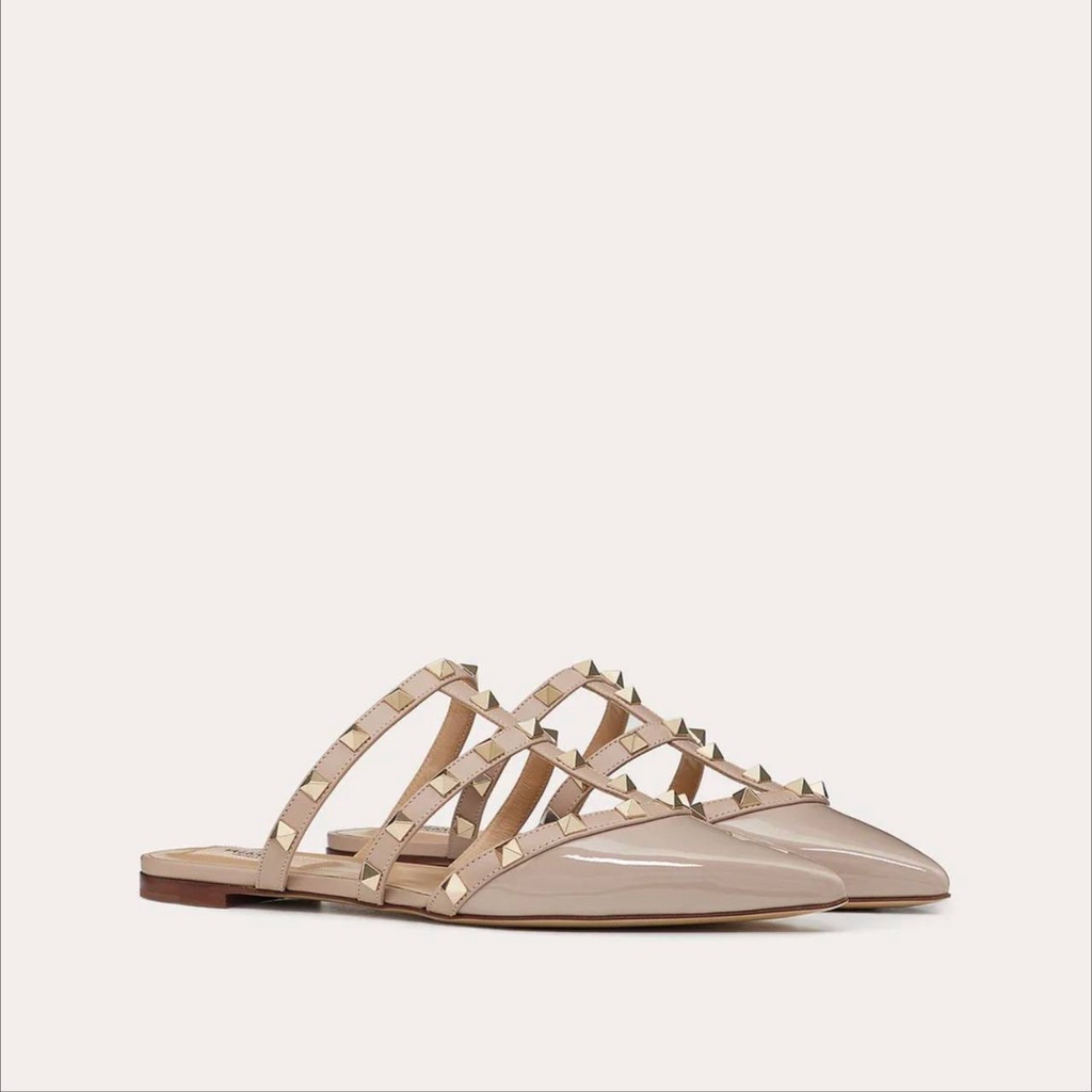 VALENTINO Rockstud Mules Flat in Nude Poudre Patent