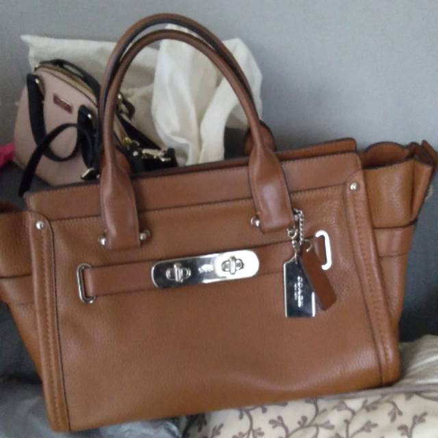 Coach swagger size 32 prelove