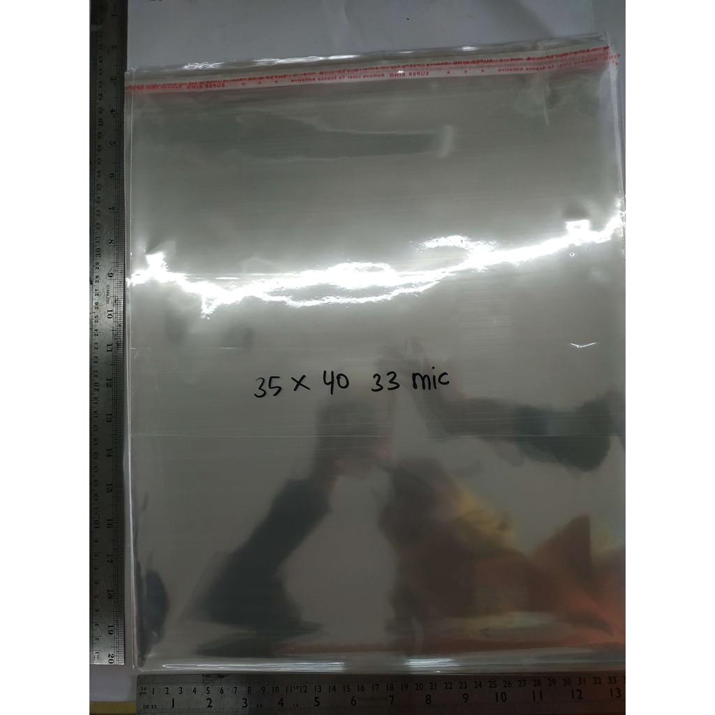 

35 x 40 cm Plastik OPP Tebal (100) (lem/seal)