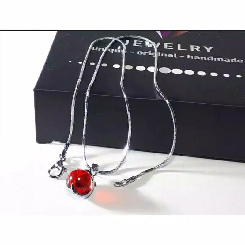 kalung titanium liontin mata kucing/liontin giok/kalung wanita